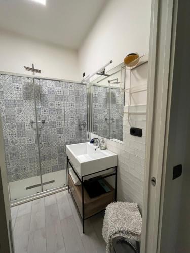 a bathroom with a sink and a shower at LE SORELLE in Rome