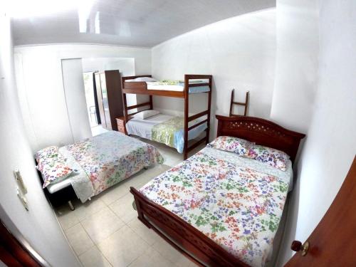 Lliteres en una habitació de apartamento vacacional san andes islas JLV