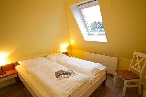 Ένα ή περισσότερα κρεβάτια σε δωμάτιο στο Wohnung-Kompass