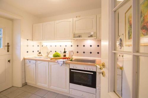 Kuchyň nebo kuchyňský kout v ubytování Wohnung-Nordwind