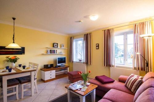TV a/nebo společenská místnost v ubytování Wohnung-Backbord