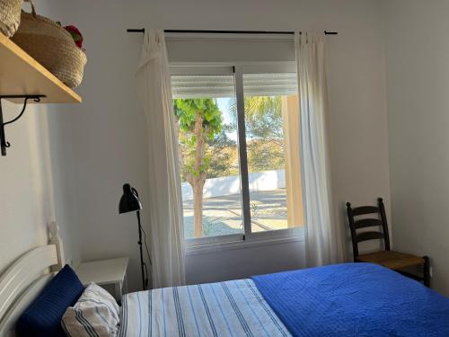 A bed or beds in a room at Casa Montana near the Coast