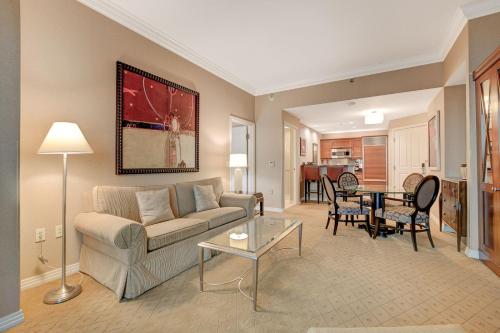 a living room with a couch and a table at Incredible 1BD 2BTH Suite MGM Signature*Balcony View in Las Vegas