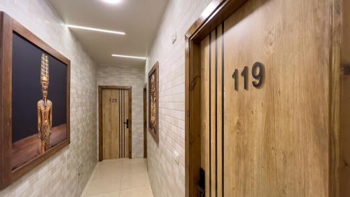 a hallway with a number on the wall at Giza Pyramids View Inn in Cairo