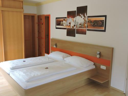 Ένα ή περισσότερα κρεβάτια σε δωμάτιο στο Hotel & Restaurant Edelweiss Alpine Lodge