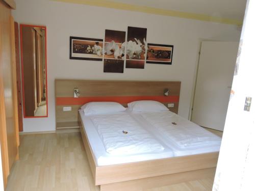 Ένα ή περισσότερα κρεβάτια σε δωμάτιο στο Hotel & Restaurant Edelweiss Alpine Lodge