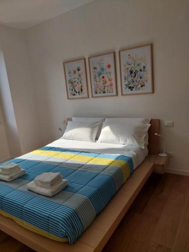 Ένα ή περισσότερα κρεβάτια σε δωμάτιο στο Casa Mappamondo