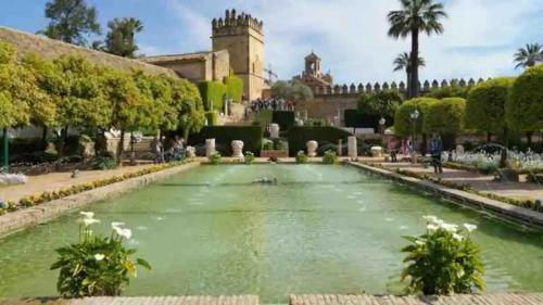 a pool of water in front of a building at Nice central flat with wonderful views in Córdoba