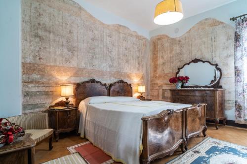Ένα ή περισσότερα κρεβάτια σε δωμάτιο στο Residence Serliana