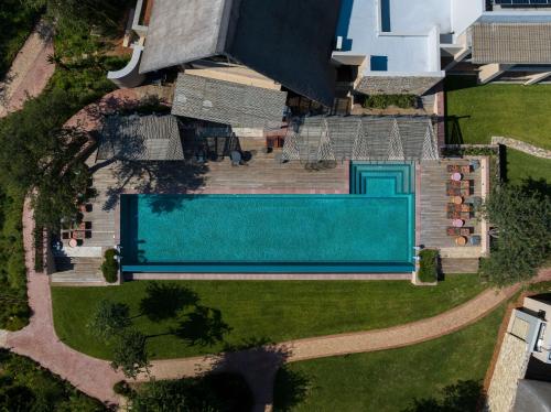 an overhead view of a swimming pool in a yard at Radisson Safari Hotel Hoedspruit in Hoedspruit