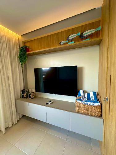 TV a/nebo společenská místnost v ubytování Flat Eco Resort Praia Dos Carneiros
