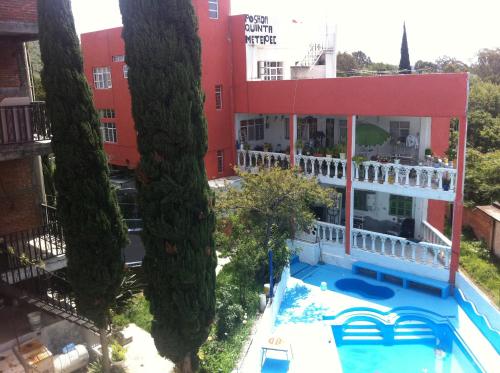 Majoituspaikan Hotel Posada Quinta Metepec uima-allas tai lähistöllä sijaitseva uima-allas