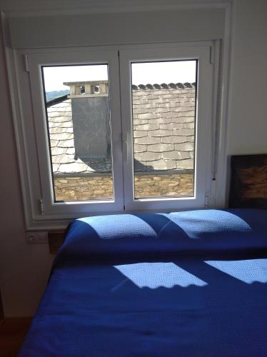 Letto o letti in una camera di A Travesía Dos Soños, Pedreiras