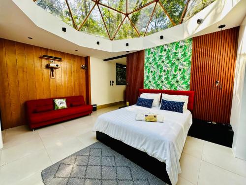 Ein Bett oder Betten in einem Zimmer der Unterkunft Macas Glamping