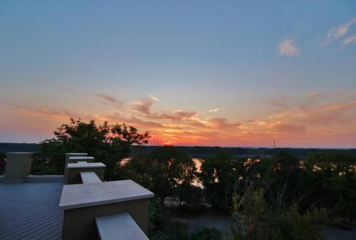 a sunset from the deck of a house at Residence House Ruse in Ruse