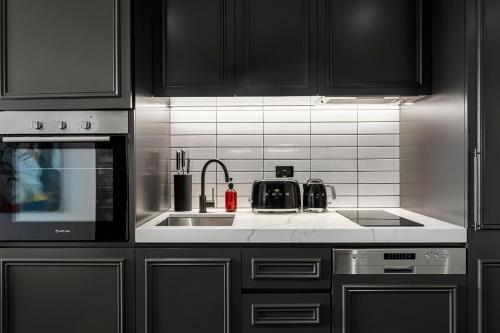 Η κουζίνα ή μικρή κουζίνα στο Modern, Industrial Hideaway