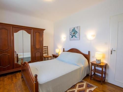 Ένα ή περισσότερα κρεβάτια σε δωμάτιο στο Maison de charme avec jardin, Wifi et proche de Sarlat et Souillac - FR-1-616-357