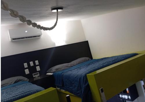 En eller flere senge i et værelse på Departamento acogedor, Diseño optimizado