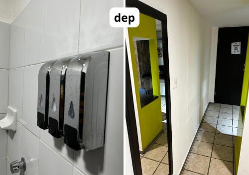 - un miroir dans la salle de bains avec un distributeur sur le mur dans l'établissement Departamento acogedor, Diseño optimizado, à Tuxtla Gutiérrez