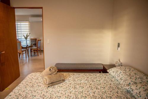 a bedroom with two beds in a room at Downtown Beach Condo w/ Pool in Cabo San Lucas