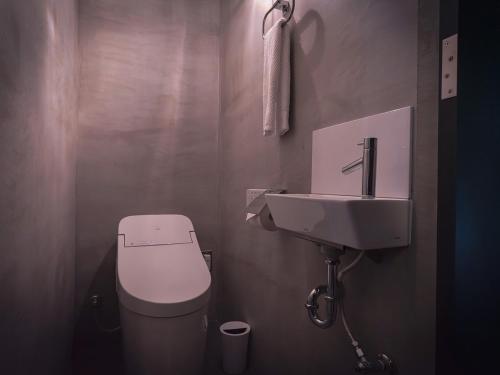 Koupelna v ubytování maejima Hotel