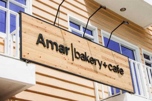 a sign on the side of a building at Amar Residence in Iligan