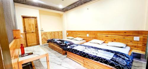 Ein Bett oder Betten in einem Zimmer der Unterkunft Destination Of Choj ( DOC)