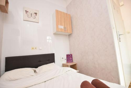 Katil atau katil-katil dalam bilik di City Central Hostel - Pokoje prywatne