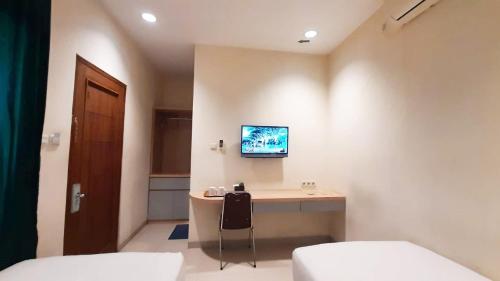 TV a/nebo společenská místnost v ubytování Hotel Cepu Indah 2