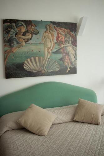Una cama o camas en una habitación de Hotel Miramare