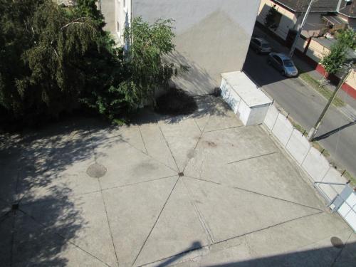 an aerial view of a sidewalk with a circle on it at Hotel Nap in Budapest