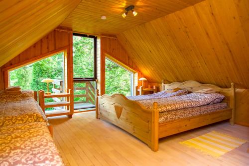 Postel nebo postele na pokoji v ubytování Truu Holiday Houses