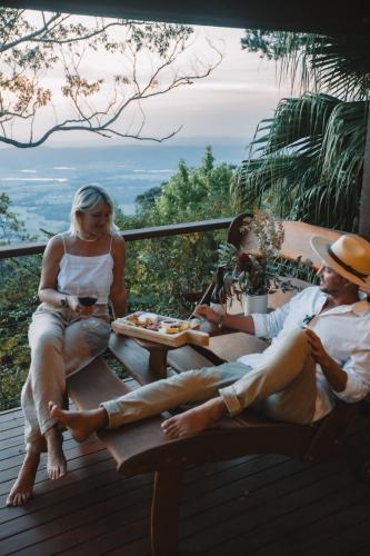 a group of people sitting on a picnic table at The Polish Place in Mount Tamborine