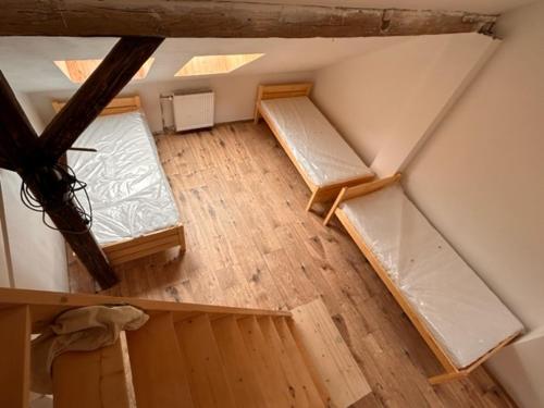 an overhead view of a room with two bunk beds at private house in Ústí nad Labem