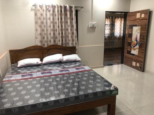 Postel nebo postele na pokoji v ubytování Annapurna Homestay