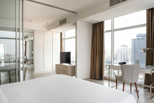Televisyen dan/atau pusat hiburan di Jasmine 59 Hotel
