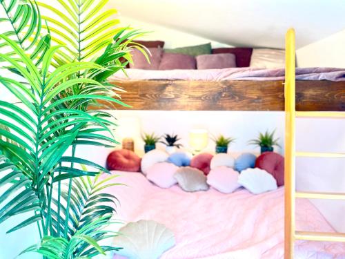 a bedroom with a bunk bed with a bunch of stuffed animals at Bohemian Eco Lodge at lake Balaton in Kisapáti