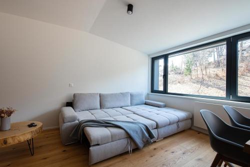 Ένα ή περισσότερα κρεβάτια σε δωμάτιο στο Ski&Bike horský apartmán 502