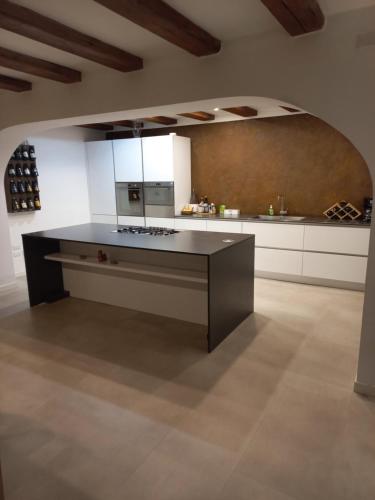 Kuchyň nebo kuchyňský kout v ubytování Appartamento indipendente - Il Portichetto