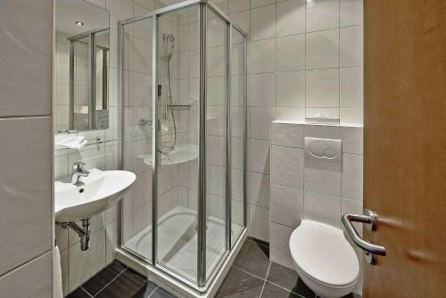 Koupelna v ubytování Hotel Arte Spreitenbach