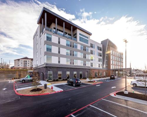 a rendering of a building with a parking lot at Hyatt Place Harrisonburg in Harrisonburg