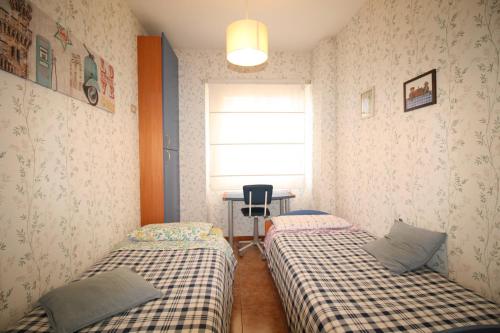 A bed or beds in a room at Marci's Home