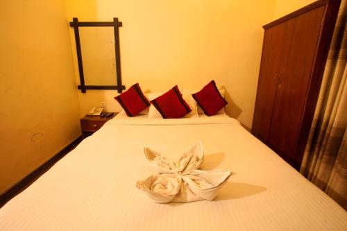 Giường trong phòng chung tại Hotel Atlantic
