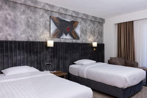 Katil atau katil-katil dalam bilik di Anemon Kent Karabük Otel