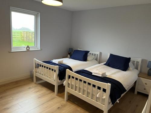 Krevet ili kreveti u jedinici u okviru objekta Fleetwood 2 bed cottage