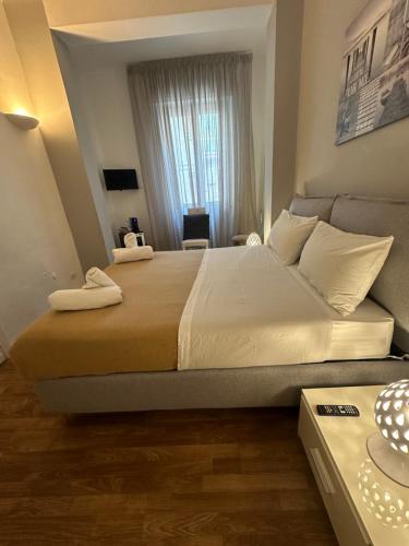 Postel nebo postele na pokoji v ubytování B&B Degli Artisti Suite