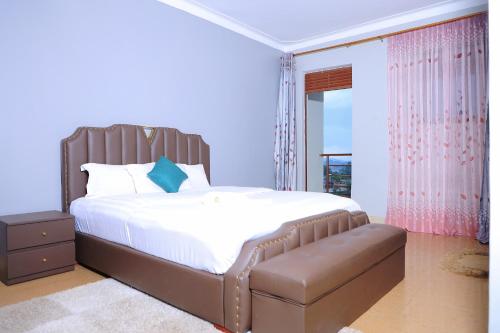 Voodi või voodid majutusasutuse Buddiez Platinum Hotel toas