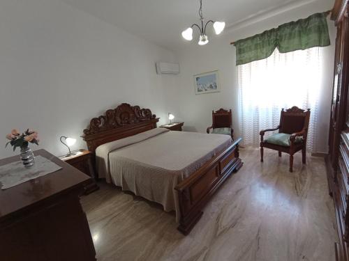 Postel nebo postele na pokoji v ubytování Casa Vacanze Saba - Lupino