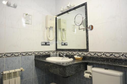 Koupelna v ubytování Hotel Portonovo