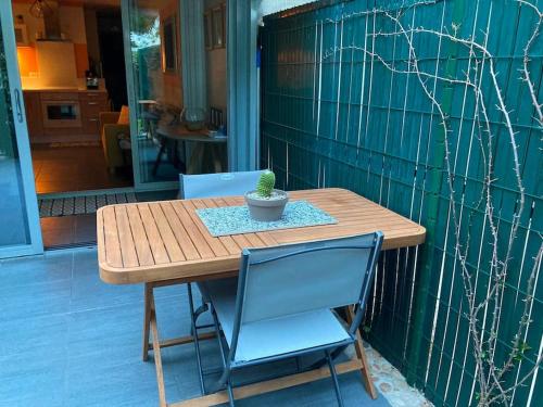 Appartement en rez-de-jardin avec terrasse